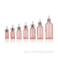 Empty glass bottles pink dropper glass bottle